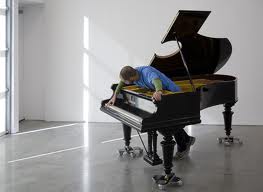 Person working with a piano